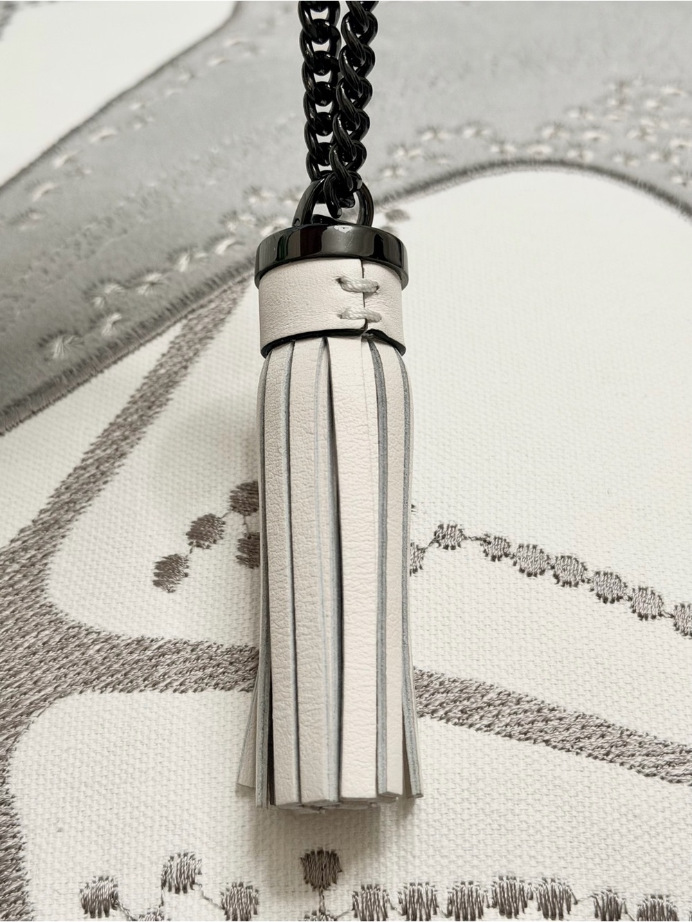 Michael Kors White Leather Tassel Keychain with Black Hardware